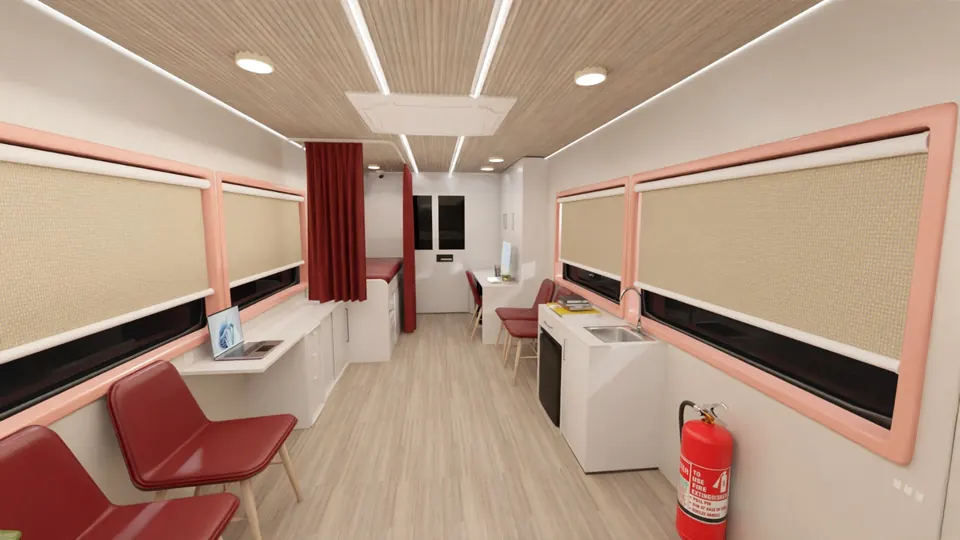 Medanta Seva Setu: interior looking down the bus, red chairs, coral frames